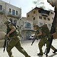 חיילים בשטחים. "מגבילים עיתונאים" צילום: איי פי