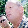 מנהל הגימנסיה אלוני. זומן לתת עדות 
