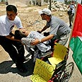הפגנה בבילעין (ארכיון) צילום: רויטרס