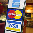 כרטיסי אשראי ויזה מסטרקארד אמריקן אקספרס (צילום: אי פי)