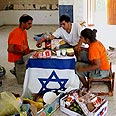 האריזה והפינוי. נצר חזני צילום: איי פי