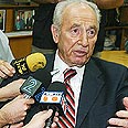 פרס. קיבל הזמנה להמשיך במפלגה צילום: עופר עמרם