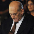 אולמרט. "כבר קבעתם שאני אשם" צילום: AP