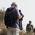 צלם עיתונות בפעולה צילום: activstills