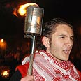 כמה נרצחו באמת? תהלוכת לפידים צילום: AFP