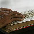 הקוראן. המוסלמים זועמים צילום: רויטרס