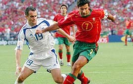 לואיס פיגו מיכאליס קאפסיס יוון פורטוגל