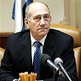 טיפול נקודתי. אולמרט צילום: איי פי