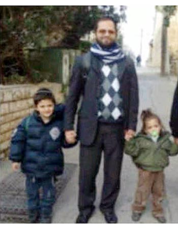 Rabbi Sandler and his 2 sons HY'D Rabbi Jonathan Sandler and his 2 sons Aryeh and Gavriel HY'D
