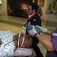יפו מאבטחים נמל אלימות מכות (צילום: מוחמד באבאי - יאפא אל-יום)