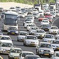 שיעור הפליטות צפוי לגדול. פקק באיילון צילום: ניב קלדרון