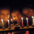 נר אל מול החושך הגדול צילום: עמית מגל