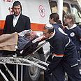 הפינוי. איתם בדרך להדסה צילום: רפי בן חקון