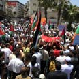 הפגנה משט עזה פלסטינים רמאללה  (צילום: עלי ואקד)