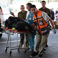 פצועים מפונים לבית החולים רמב"ם צילום: אבישג שאר-ישוב