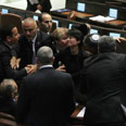 אלימות בכנסת. השרים מתלוננים על כובד המסים צילום: גיל יוחנן