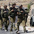 חיילים בית חגי ירי חברון שוטרים חברון קריית ארבע אל-פוואר (צילום: AP) חיילים בית חגי ירי חברון שוטרים חברון קריית ארבע אל-פוואר (צילום: AP)
