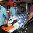 פינוי פצוע פצועים תאונה תאונת דרכים רכבת מיניבוס קרית גת קריית גת בית חולים סורוקה (צילום: הרצל יוסף)
