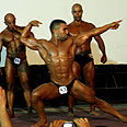 תחרות פיתוח גוף בודי בילדינג עזה (צילום: AP)