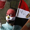 מצרים אופוזיציה ילד מפגין הפגנה כיכר א-תחריר (צילום: AFP)