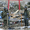 צילום: AP Photo/Kyodo News