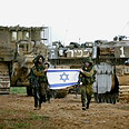 כוחות יוצאים מעזה. מודעות מוסרית גבוהה צילום: רויטרס