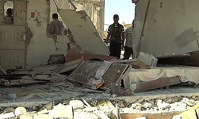 שרידי מבנה הרוס בעיר חומס (צילום: AFP PHOTO / HO / UNSMIS)