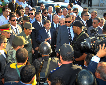 הנשיא מורסי מבקר באל עריש, שלשום (צילום: AFP)
