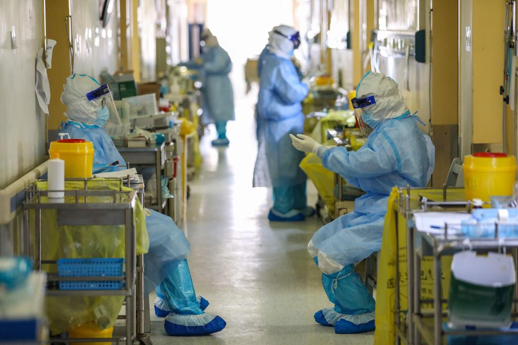 Medical teams wear protective gear for dealing with coronavirus patients in Wuhan, China  ()